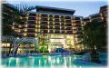 Hotel and swimming pool illuminated at night in Albena
