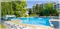 Outdoor swimming pool with sun loungers in Albena